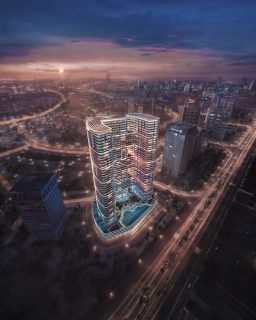 вид с воздуха на освещенный небоскреб Binghatti Hills с бассейном