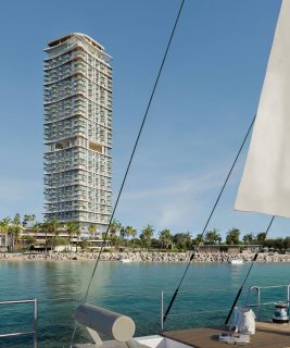 Современная прибрежная жилая башня с террасами и видом на океан