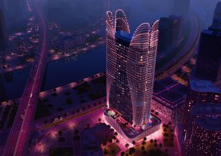 Ночной аэроснимок башни Skyhall в Business Bay